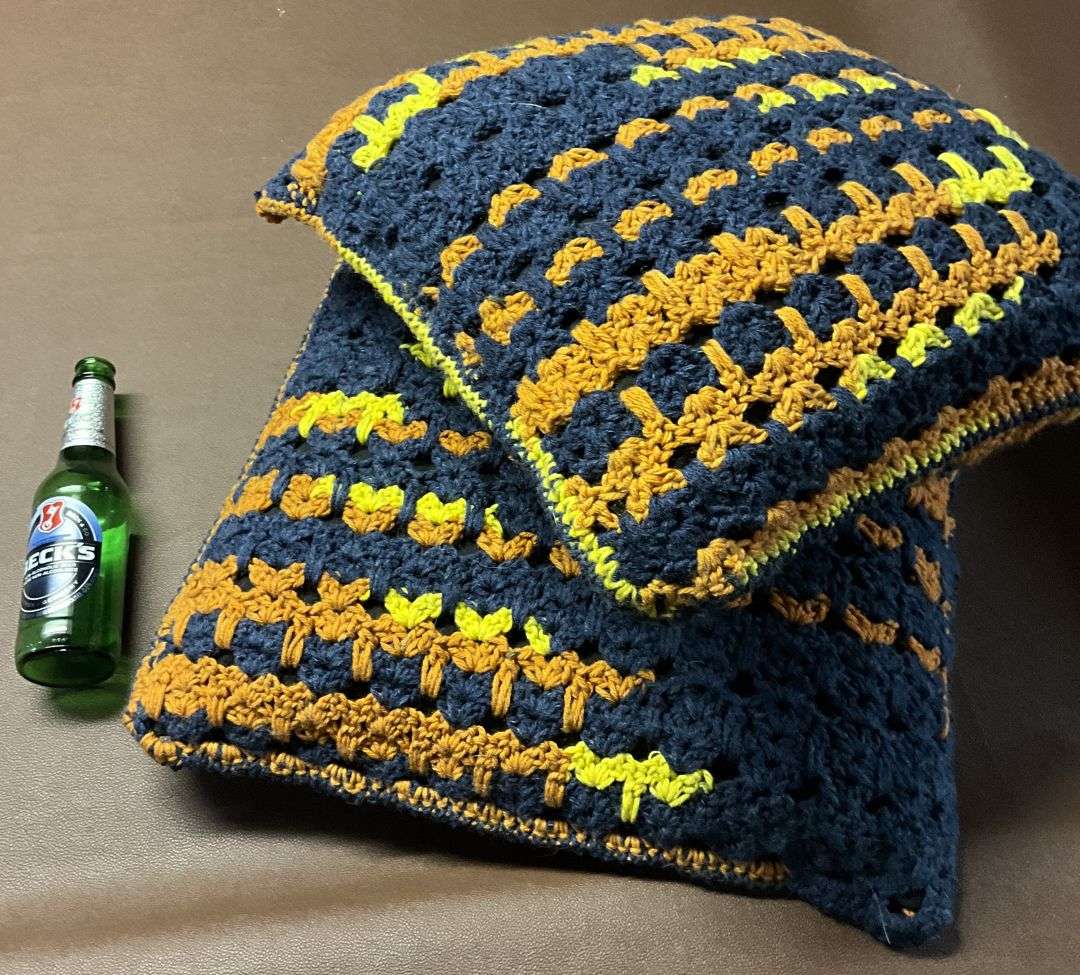 Two Hand Knitted Pillows
