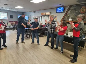 Bob Accepts Bragging Rights Trophy