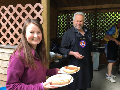 This is Zoey who helped with the weigh-in. I think that's Mill Bay Lion's Ron bending over the outdoor grill.