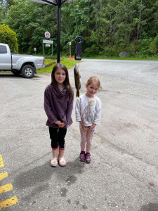 Two sisters show off their prize trout.